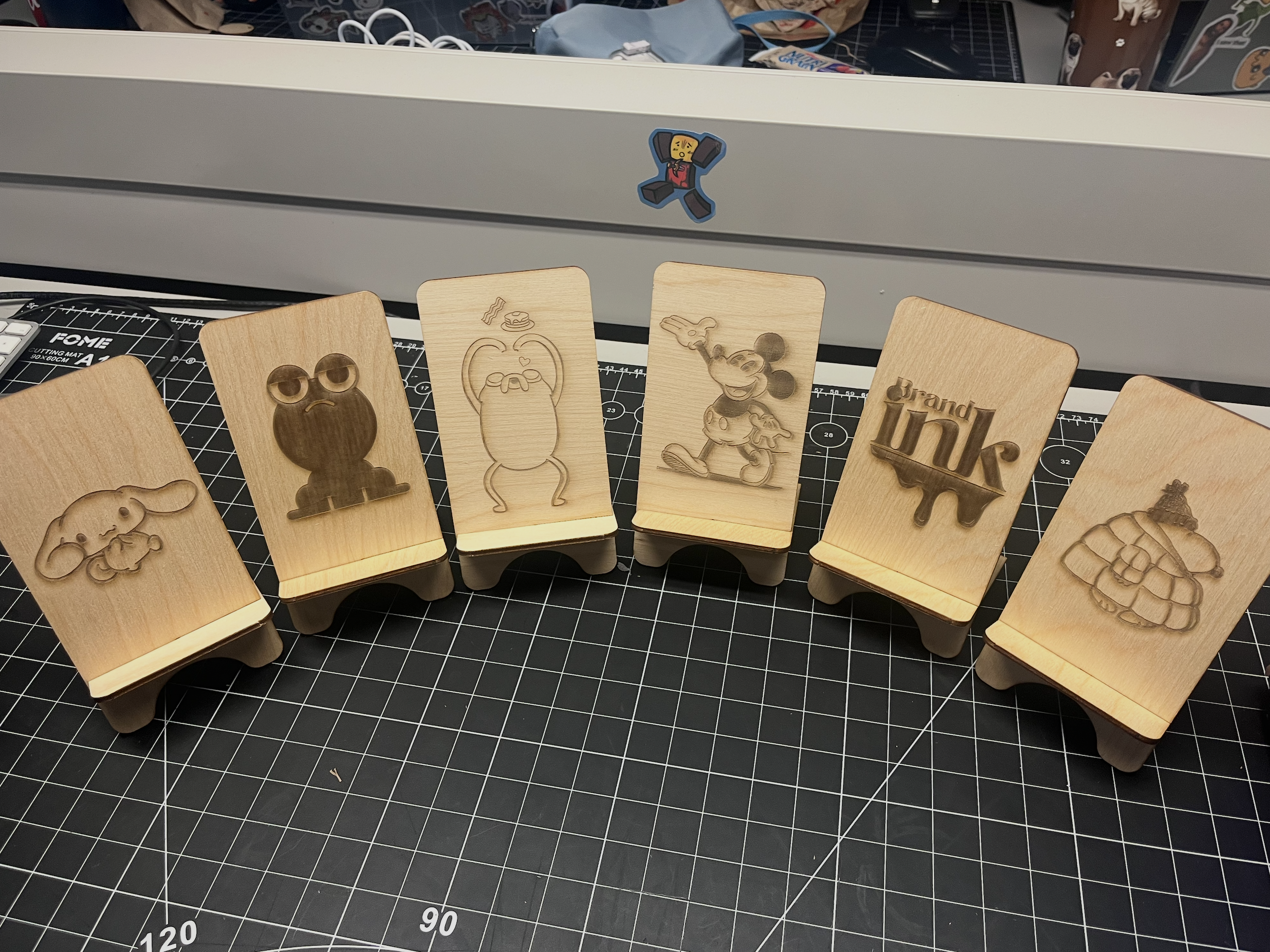 An image taken while working in a group to complete the laser cutting activity of all the completed pieces in the group.