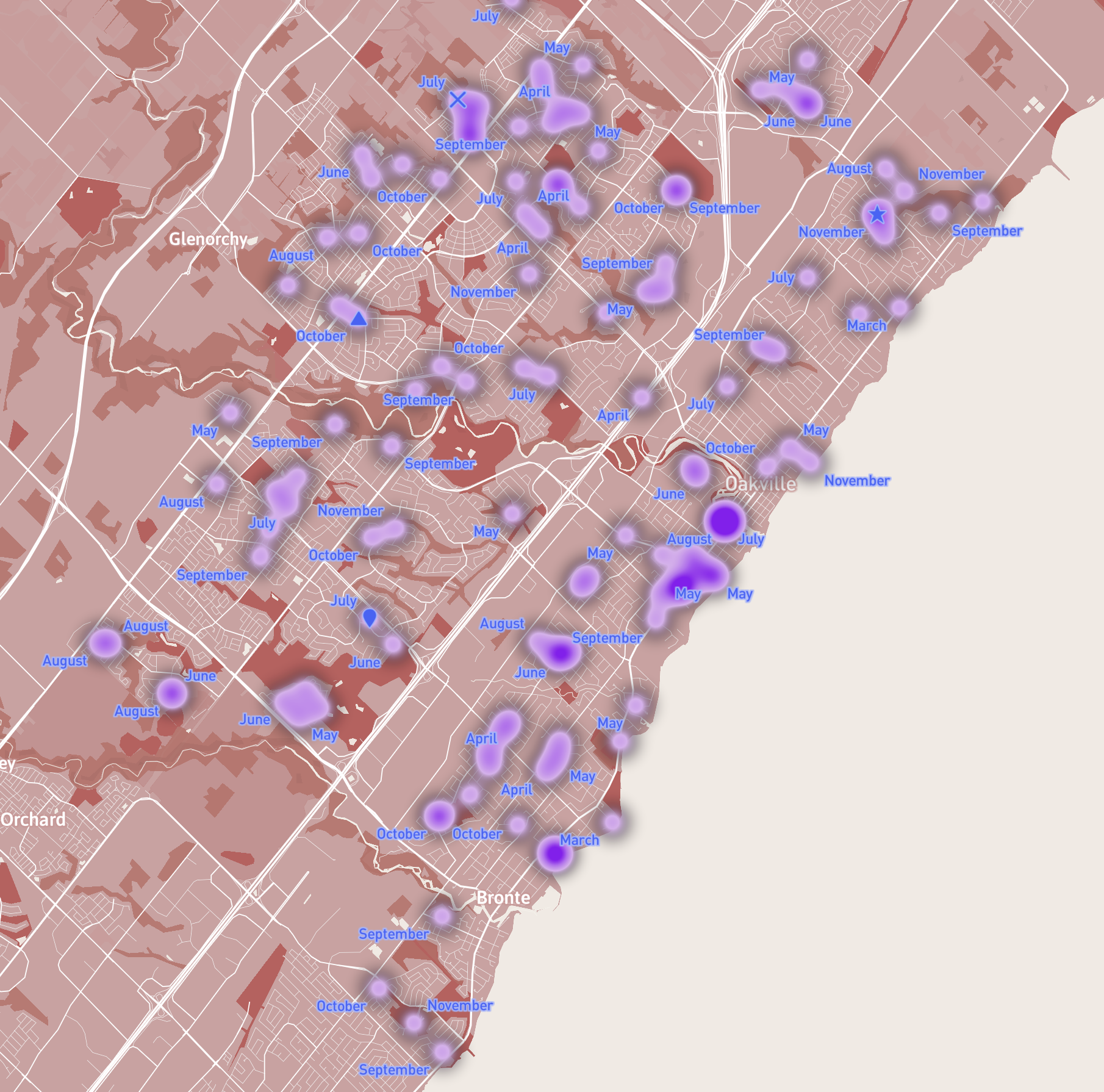 A screenshot of exploring in Mapbox with a heat map representing house break ins in Oakville in the last 8 months with months labelled.